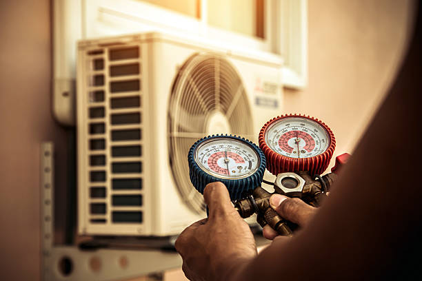 Professional Air Conditioning Service technician working in Edgewood, WA